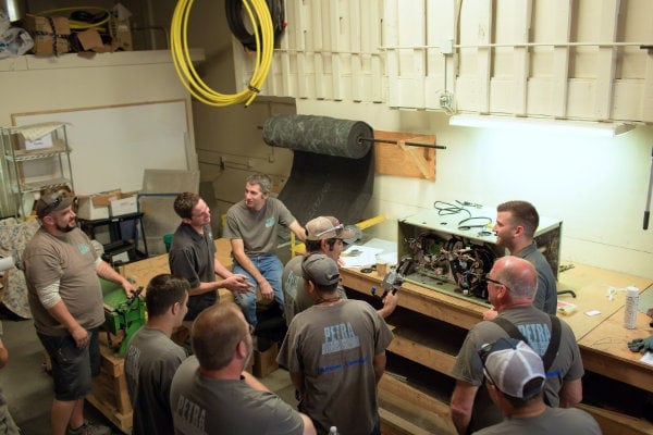 Petra Heating & Air Conditioning team during a morning meeting in Clackamas, OR.