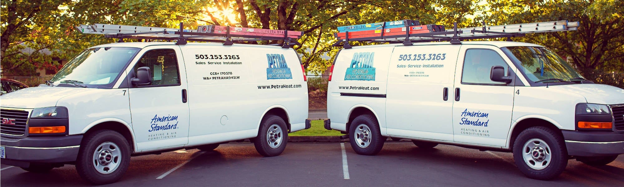 Petra Heating & Air Conditioning service vans.